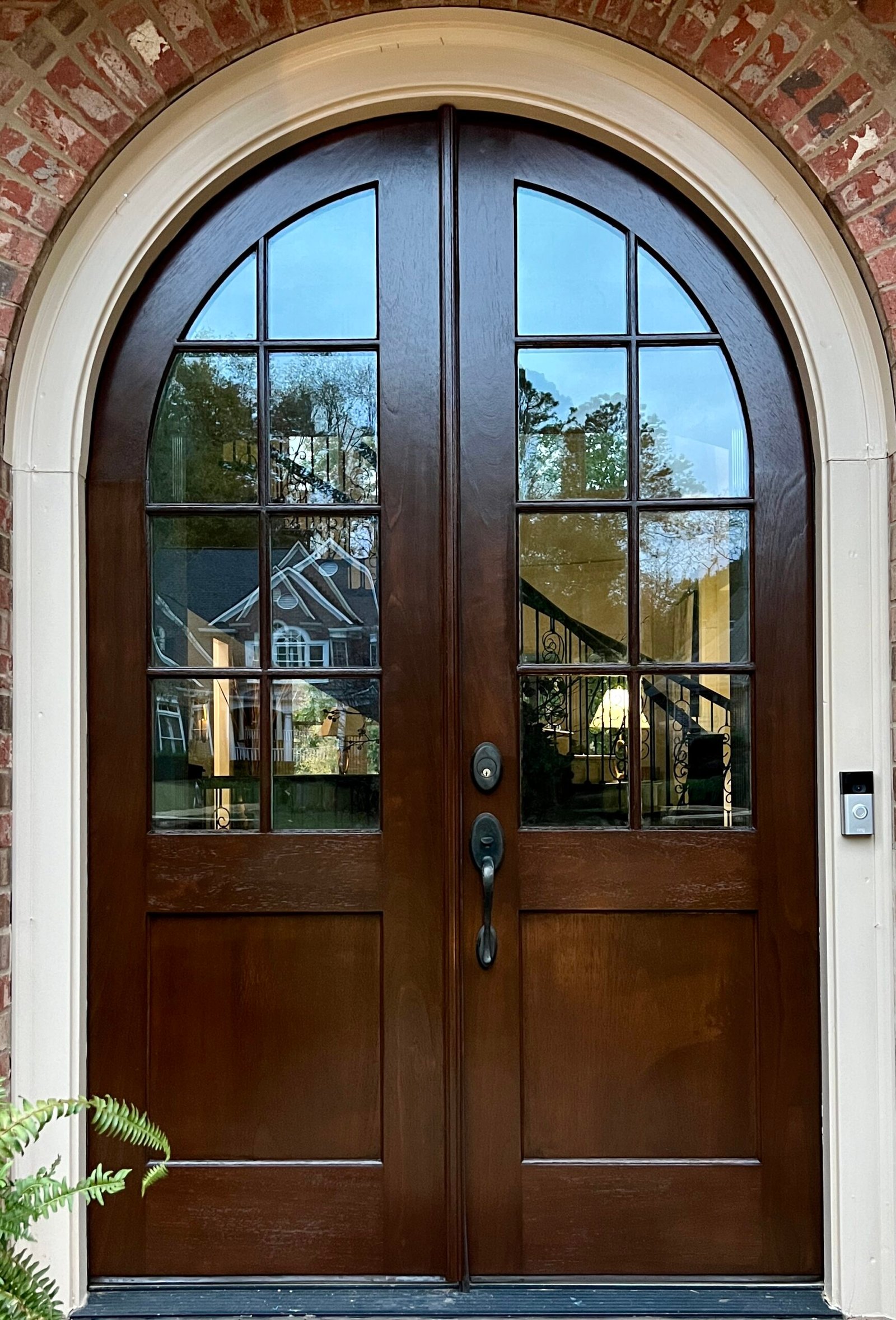 Restored wooden door with a fresh, renewed finish