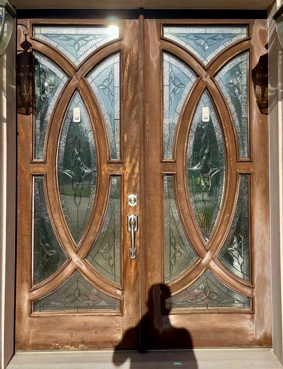 Wooden door with weathered, vanished paint