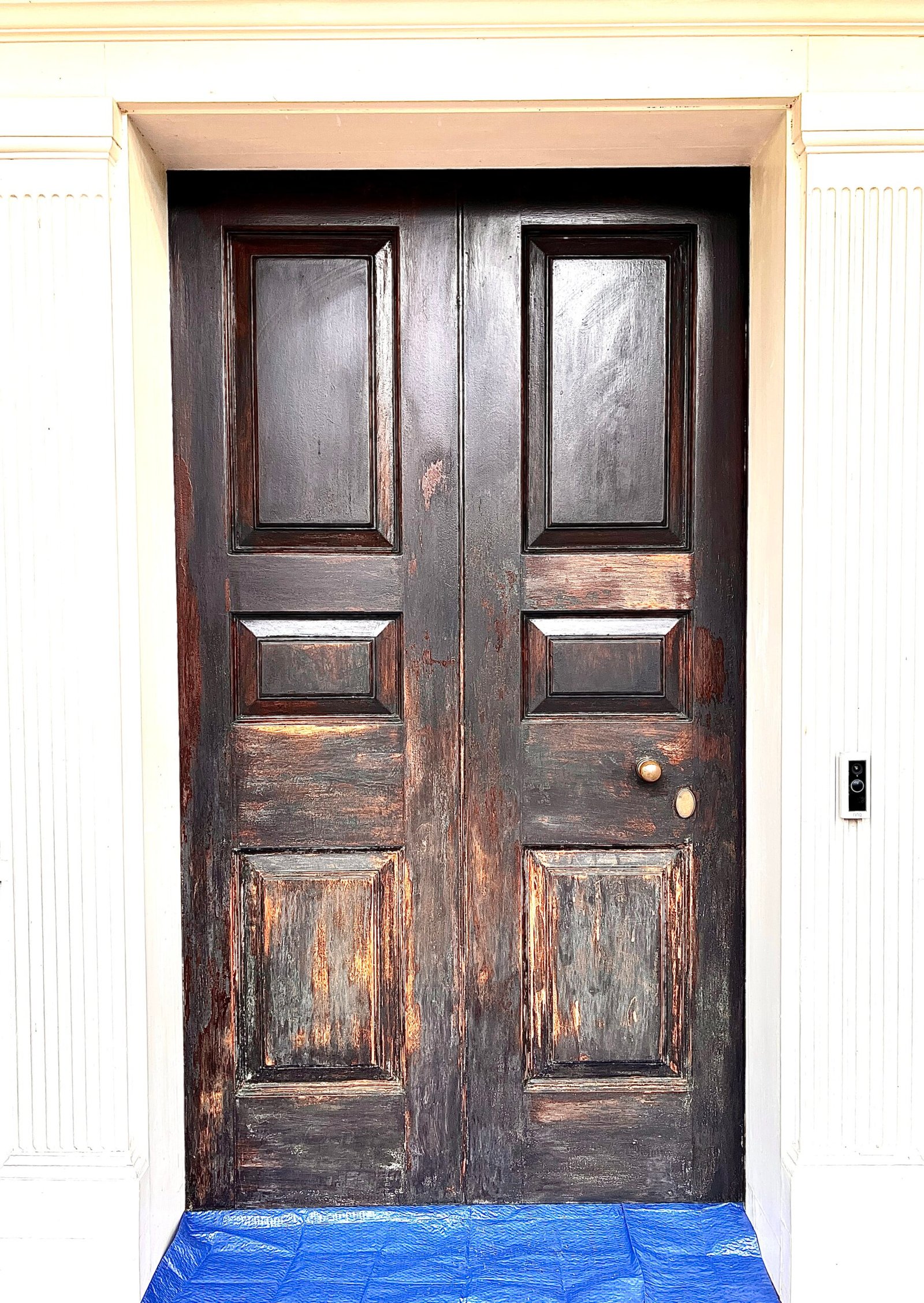 wooden door with a weathered appearance