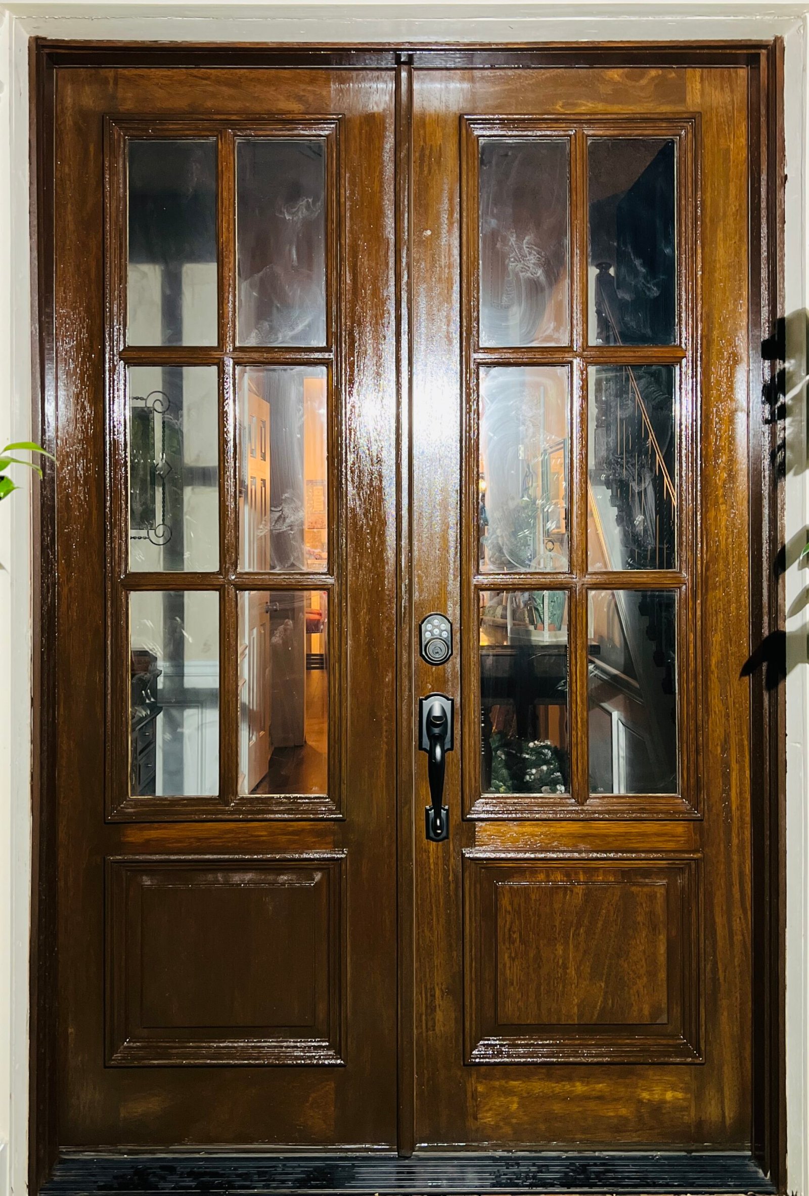 Repainted wooden door with a fresh, vibrant finish